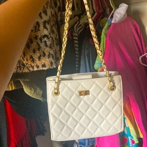 White hand bag